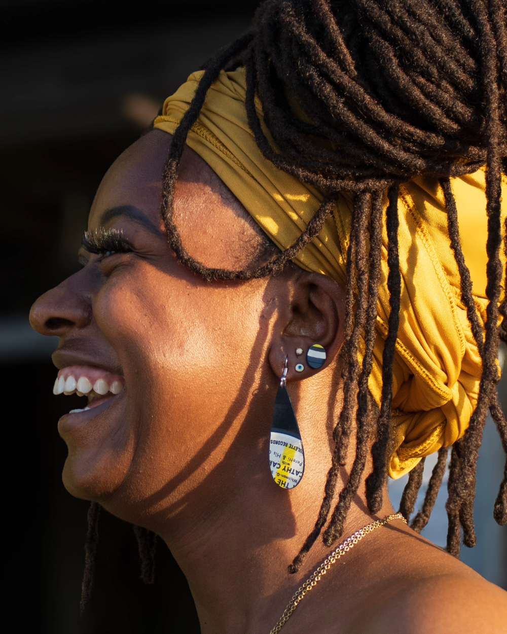 Woman wearing reVinyled earrings made from the Roulette record