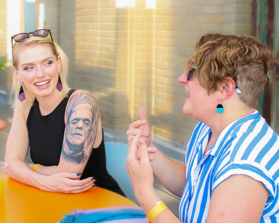 People wearing reVinyled earrings while spending time together