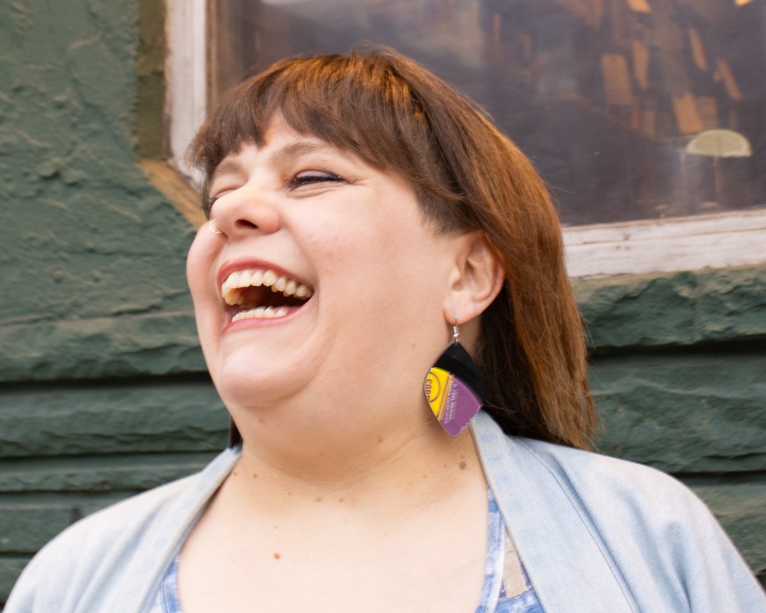 Large petal reVinyled vinyl record earrings being worn