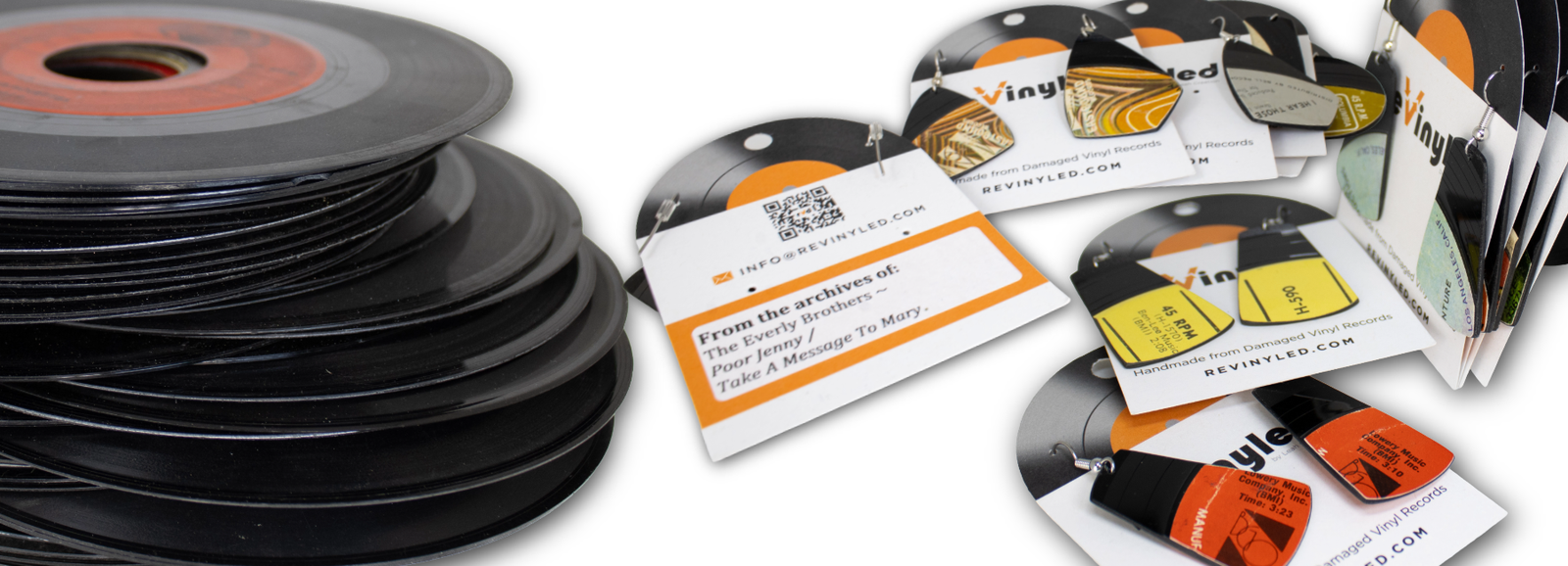 Handcrafted reVinyled earrings, record packaging, and rescued vinyl records