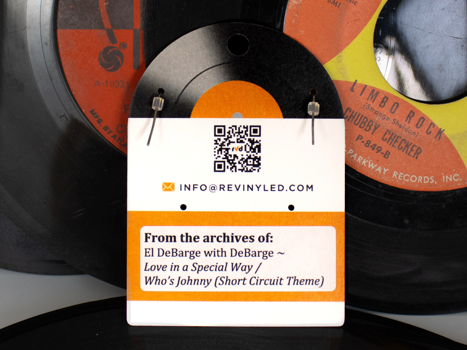 The back of a reVinyled jewelry card showing the record history
