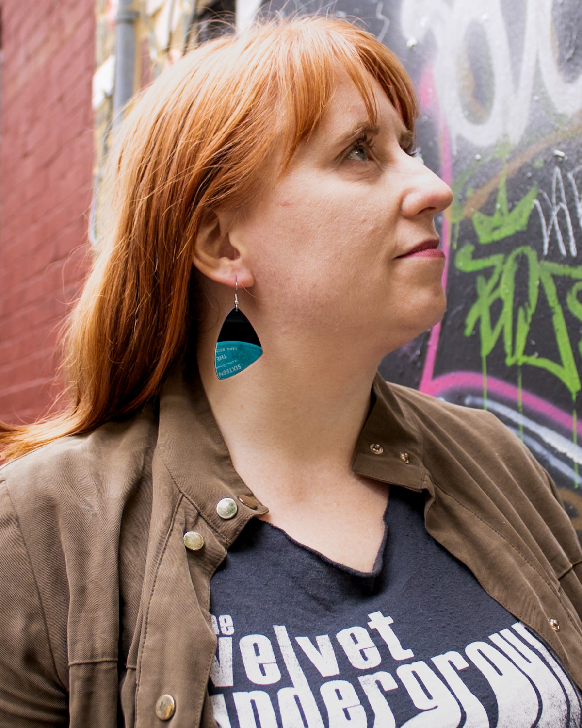 Customer wearing handcrafted reVinyled earrings