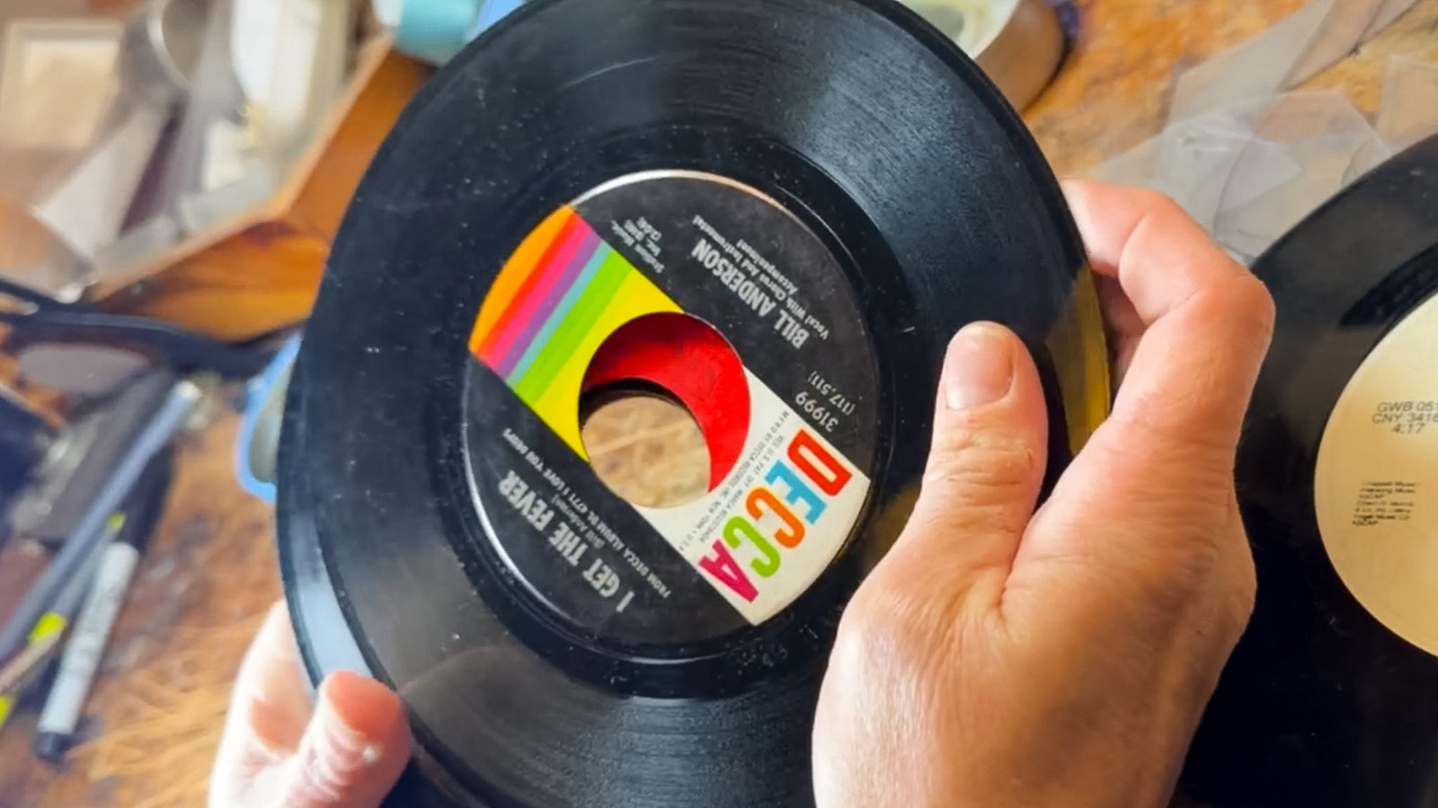 Rescued records and reVinyled earrings in a lifestyle setting
